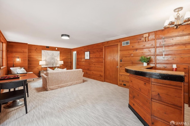 1944 15th Ave, San Francisco, CA 94116 - living room with wooden walls, light colored carpet, and a chandelier