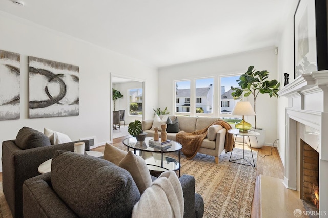 1944 15th Ave, San Francisco, CA 94116 - living room with a premium fireplace, wood finished floors, and baseboards