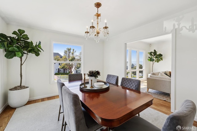 1944 15th Ave, San Francisco, CA 94116 - dining room with a chandelier, wood finished floors, and baseboards