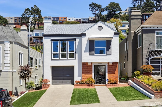 1944 15th Ave, San Francisco, CA 94116 - view of front of house with stucco siding, a garage, concrete driveway, brick siding, and a residential view