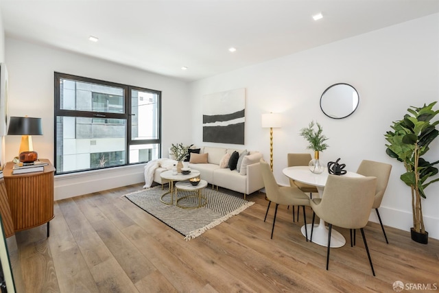 living room with light hardwood / wood-style floors