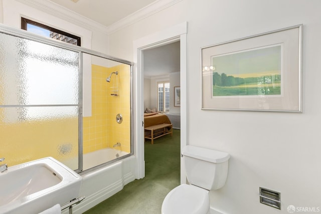 full bathroom featuring enclosed tub / shower combo, ornamental molding, toilet, and sink