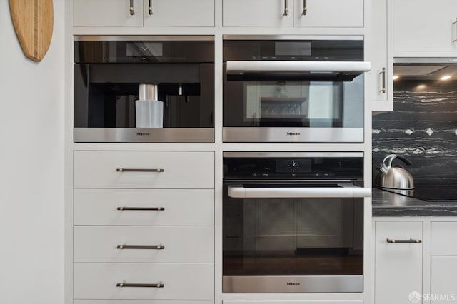 kitchen with white cabinets