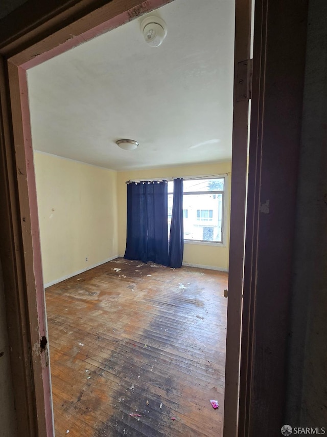 empty room featuring hardwood / wood-style floors