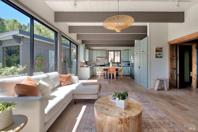 sunroom / solarium with beam ceiling