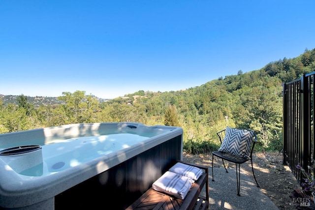 view of patio with a hot tub