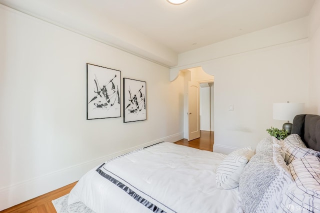 bedroom featuring hardwood / wood-style floors