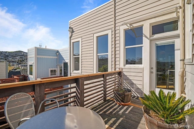 view of wooden balcony with a wooden deck