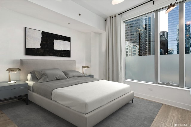 201 Folsom St Unit 2A, San Francisco, CA 94105 - bedroom with wood finished floors and a city view