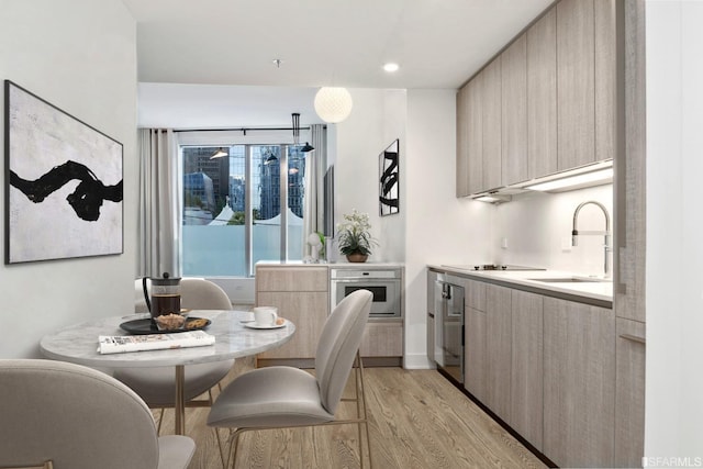 201 Folsom St Unit 2A, San Francisco, CA 94105 - dining space featuring light wood-style flooring and recessed lighting
