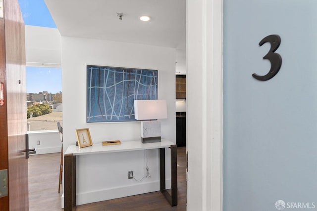 hallway featuring hardwood / wood-style floors