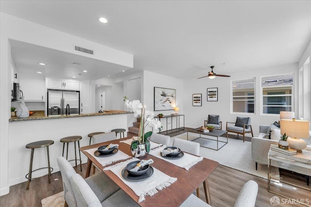 114 Emerald Cove Ter, San Francisco, CA 94134 - dining space with wood finished floors, ceiling fan, and recessed lighting