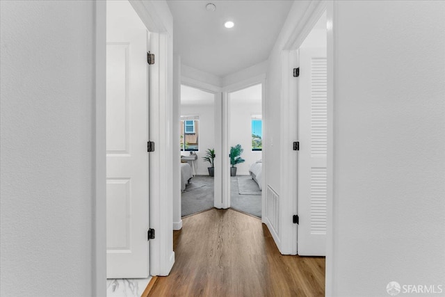 114 Emerald Cove Ter, San Francisco, CA 94134 - corridor with wood finished floors and recessed lighting