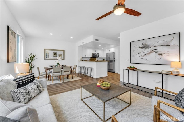 114 Emerald Cove Ter, San Francisco, CA 94134 - living area featuring a ceiling fan, wood finished floors, and recessed lighting