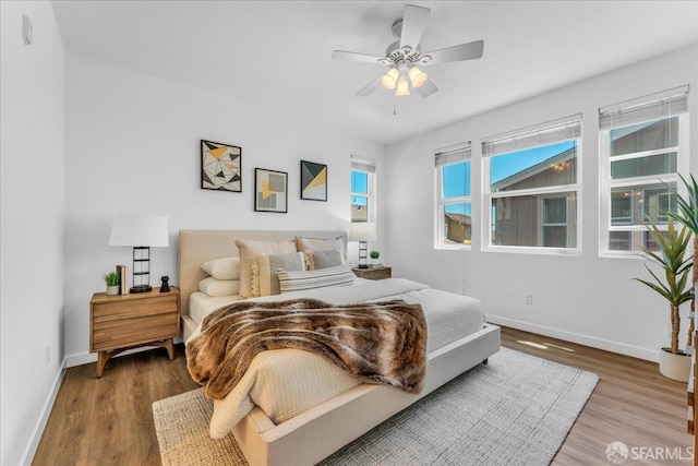114 Emerald Cove Ter, San Francisco, CA 94134 - bedroom with baseboards, wood finished floors, and ceiling fan