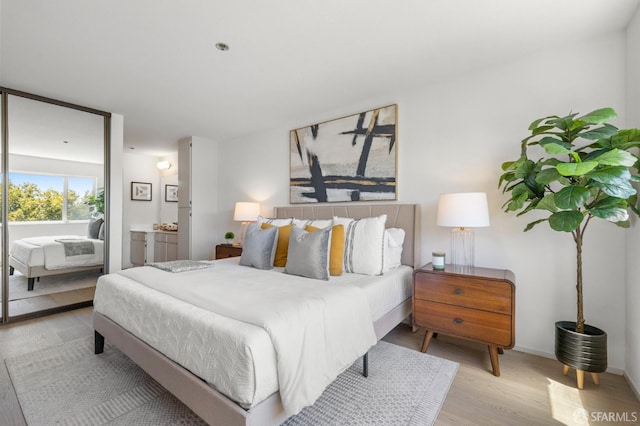 389 Belmont St Unit 306, Oakland, CA 94610 - bedroom featuring wood finished floors