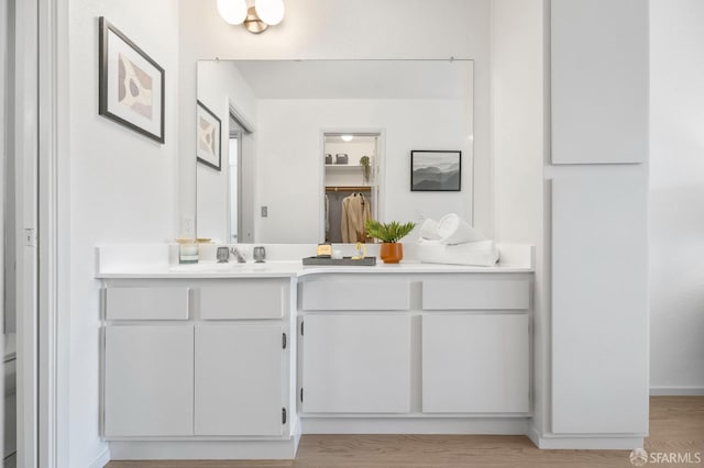 389 Belmont St Unit 306, Oakland, CA 94610 - full bath featuring vanity and wood finished floors