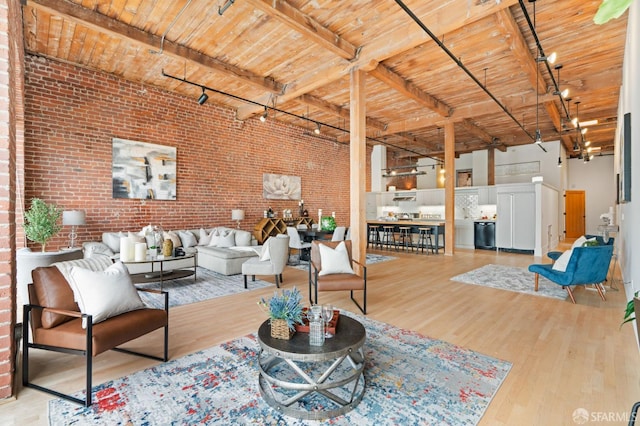 355 Bryant St Unit 411, San Francisco, CA 94107 - living area featuring brick wall, wood finished floors, wood ceiling, and track lighting