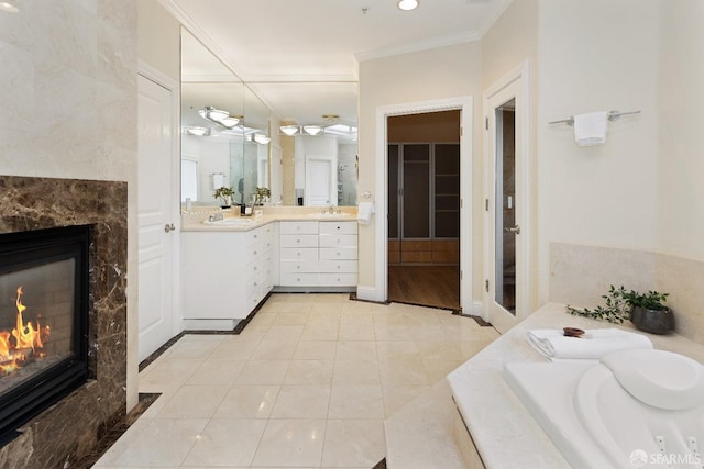 110 Sheridan Rd, Oakland, CA 94618 - full bathroom featuring a glass covered fireplace, tile patterned flooring, vanity, a garden tub, and ornamental molding