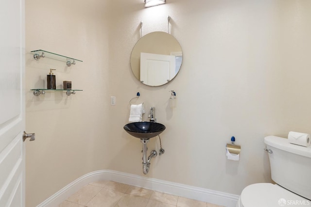 110 Sheridan Rd, Oakland, CA 94618 - bathroom with toilet, tile patterned flooring, and baseboards