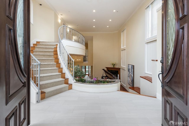 110 Sheridan Rd, Oakland, CA 94618 - foyer entrance with stairway, crown molding, recessed lighting, and baseboards