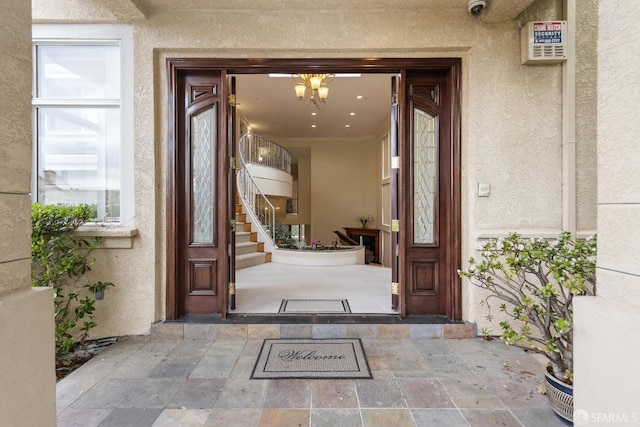 110 Sheridan Rd, Oakland, CA 94618 - doorway to property with stucco siding and a surveillance system