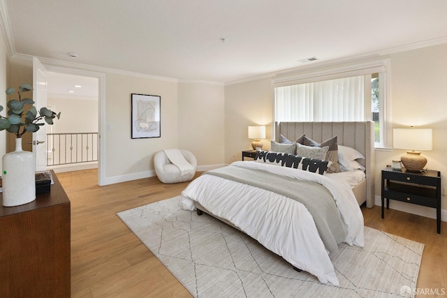 110 Sheridan Rd, Oakland, CA 94618 - bedroom with light wood-style flooring, crown molding, and baseboards