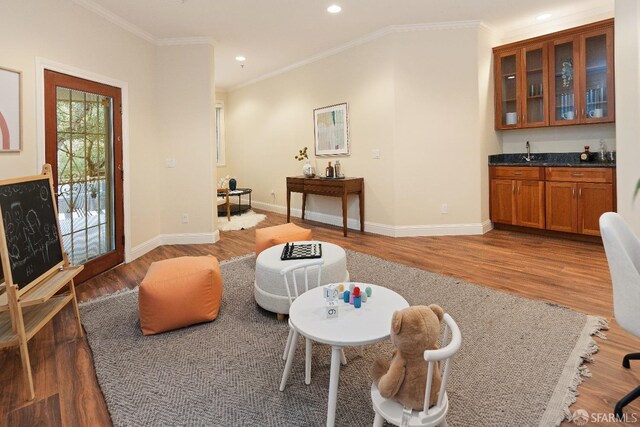 110 Sheridan Rd, Oakland, CA 94618 - living area with wood finished floors, recessed lighting, baseboards, and ornamental molding