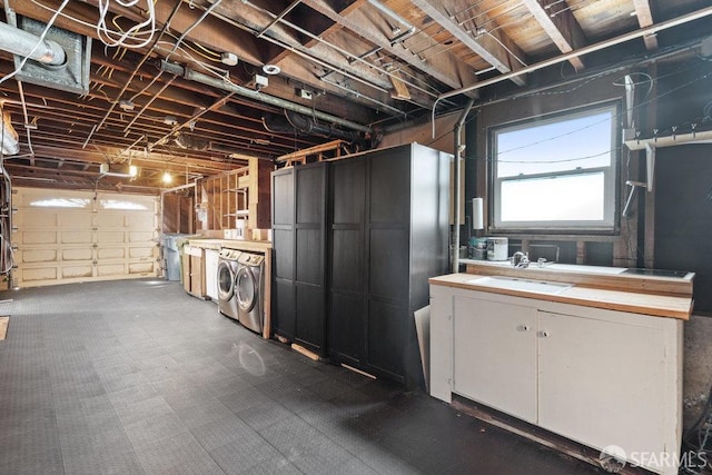 garage with washer / clothes dryer and sink