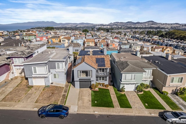 birds eye view of property featuring a mountain view