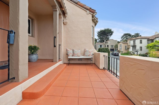 balcony featuring a residential view