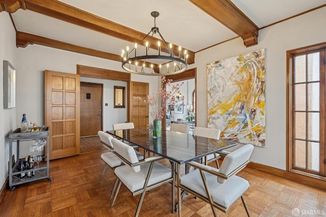 dining area featuring beamed ceiling, baseboards, and a notable chandelier