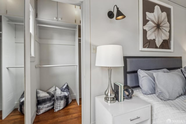 bedroom featuring wood finished floors