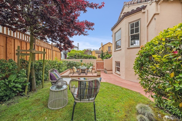 view of yard with a patio area and fence