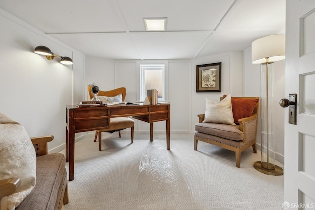 office space with baseboards and carpet floors