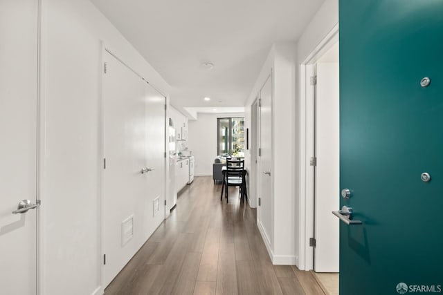 hallway featuring hardwood / wood-style floors