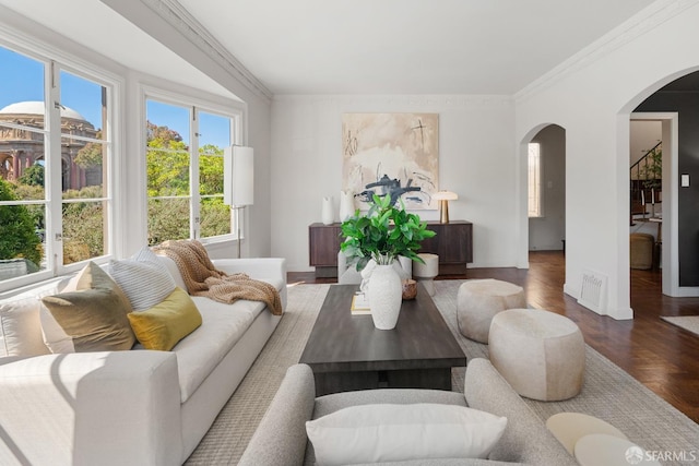 living room featuring dark hardwood / wood-style floors and crown molding