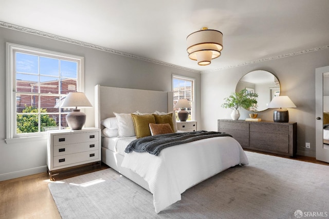 bedroom featuring light wood-type flooring