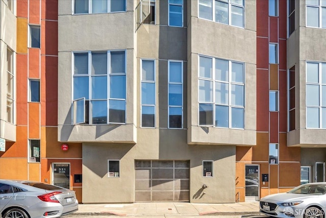 view of building exterior featuring an attached garage