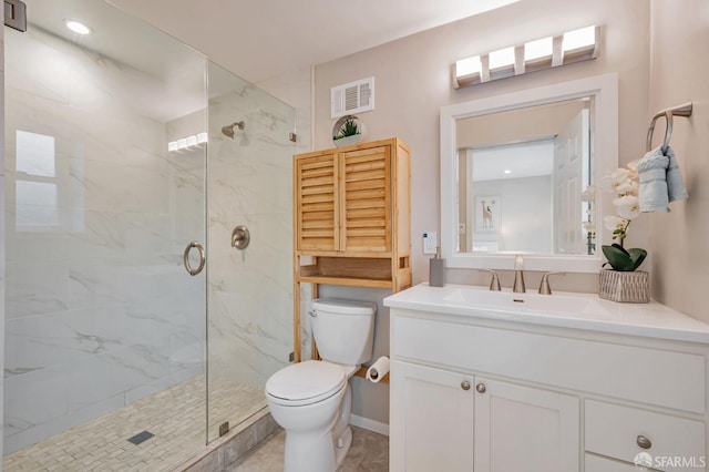 full bath with a marble finish shower, visible vents, baseboards, toilet, and vanity