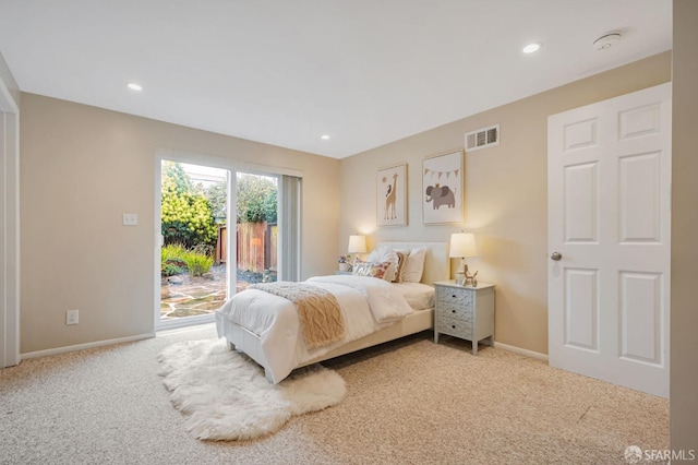 carpeted bedroom featuring access to exterior, recessed lighting, baseboards, and visible vents