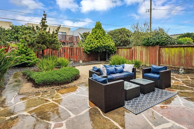 view of patio / terrace featuring a fenced backyard and outdoor lounge area