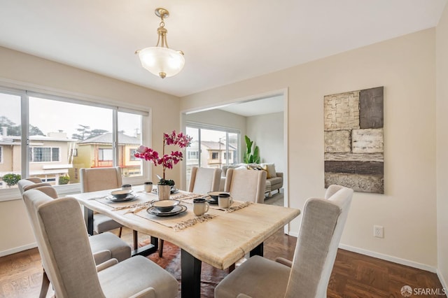 dining space with baseboards