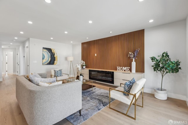 2055 42nd Ave, San Francisco, CA 94116 - living room featuring recessed lighting, wood finished floors, and a glass covered fireplace
