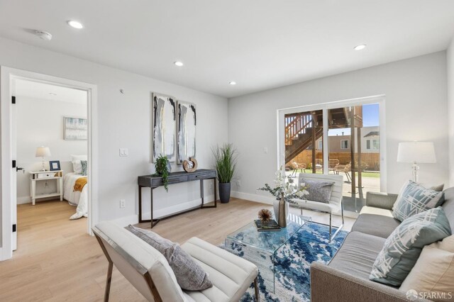 2055 42nd Ave, San Francisco, CA 94116 - living room with light wood-style flooring and recessed lighting