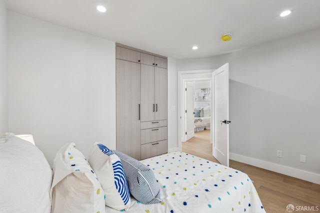 2055 42nd Ave, San Francisco, CA 94116 - bedroom with recessed lighting and light wood-type flooring