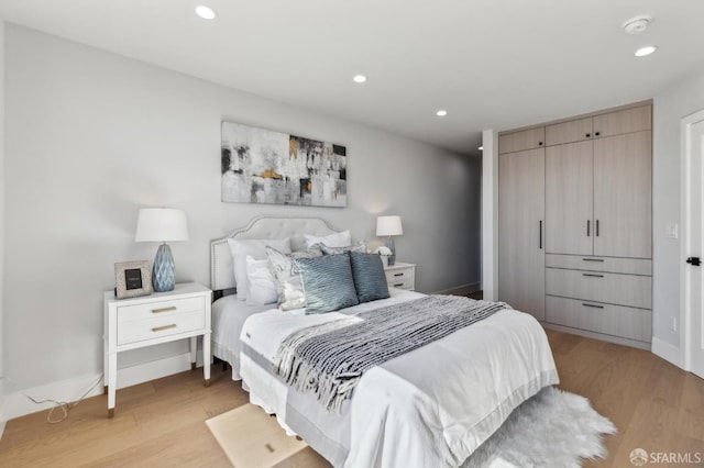 2055 42nd Ave, San Francisco, CA 94116 - bedroom featuring light wood-style flooring and recessed lighting