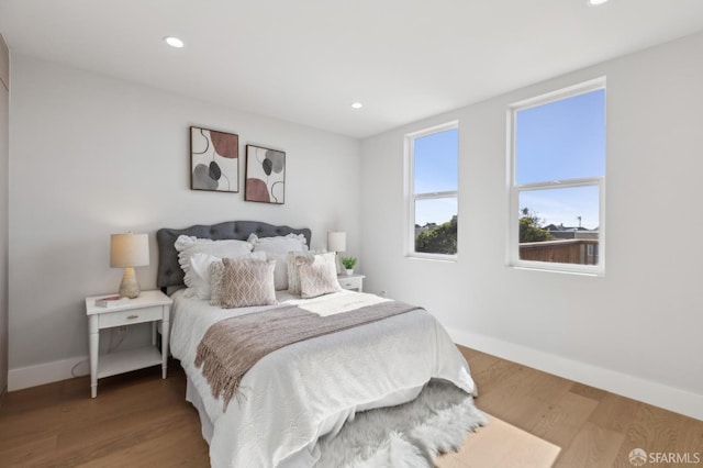 2055 42nd Ave, San Francisco, CA 94116 - bedroom featuring wood finished floors and recessed lighting