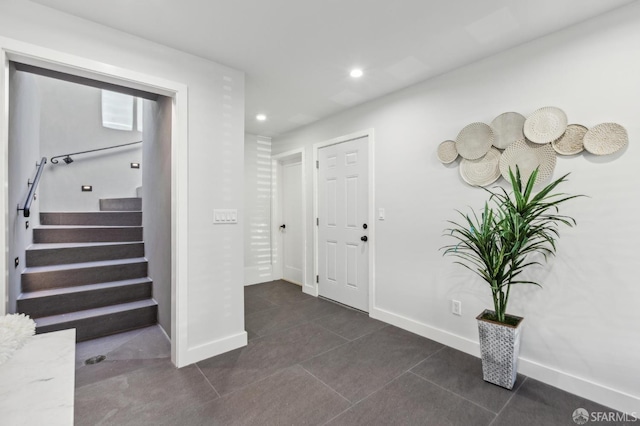 2055 42nd Ave, San Francisco, CA 94116 - entrance foyer featuring stairway, dark tile patterned flooring, and recessed lighting