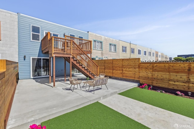 2055 42nd Ave, San Francisco, CA 94116 - fenced backyard with a patio, stairs, and a wooden deck